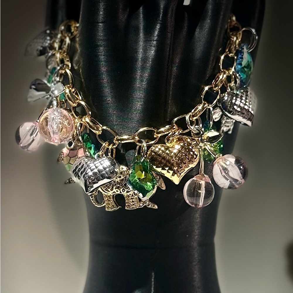 Charming Gold and Silver Elephant Charm Bracelet